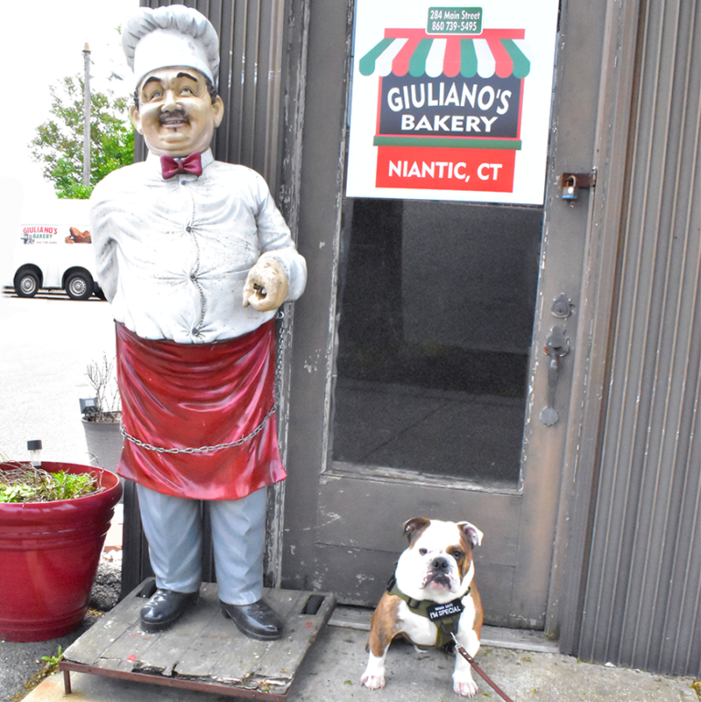 Giuliano's entrance, mascot. and friendly dog. Niantic Connecticut sign